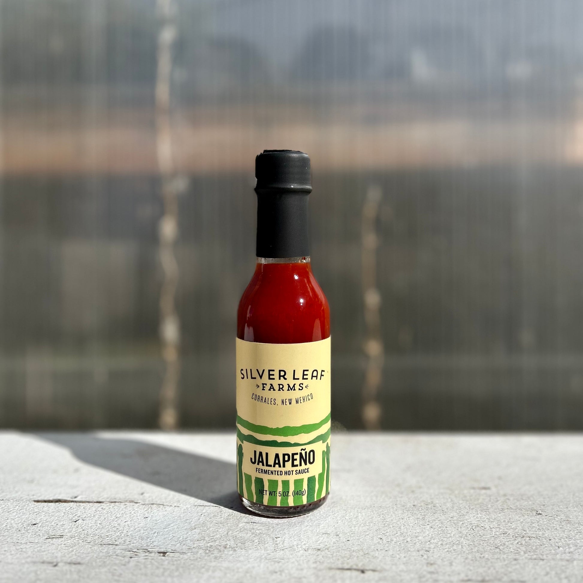 Bottle of Silver Leaf Farms Red Jalapeño Fermented Hot Sauce