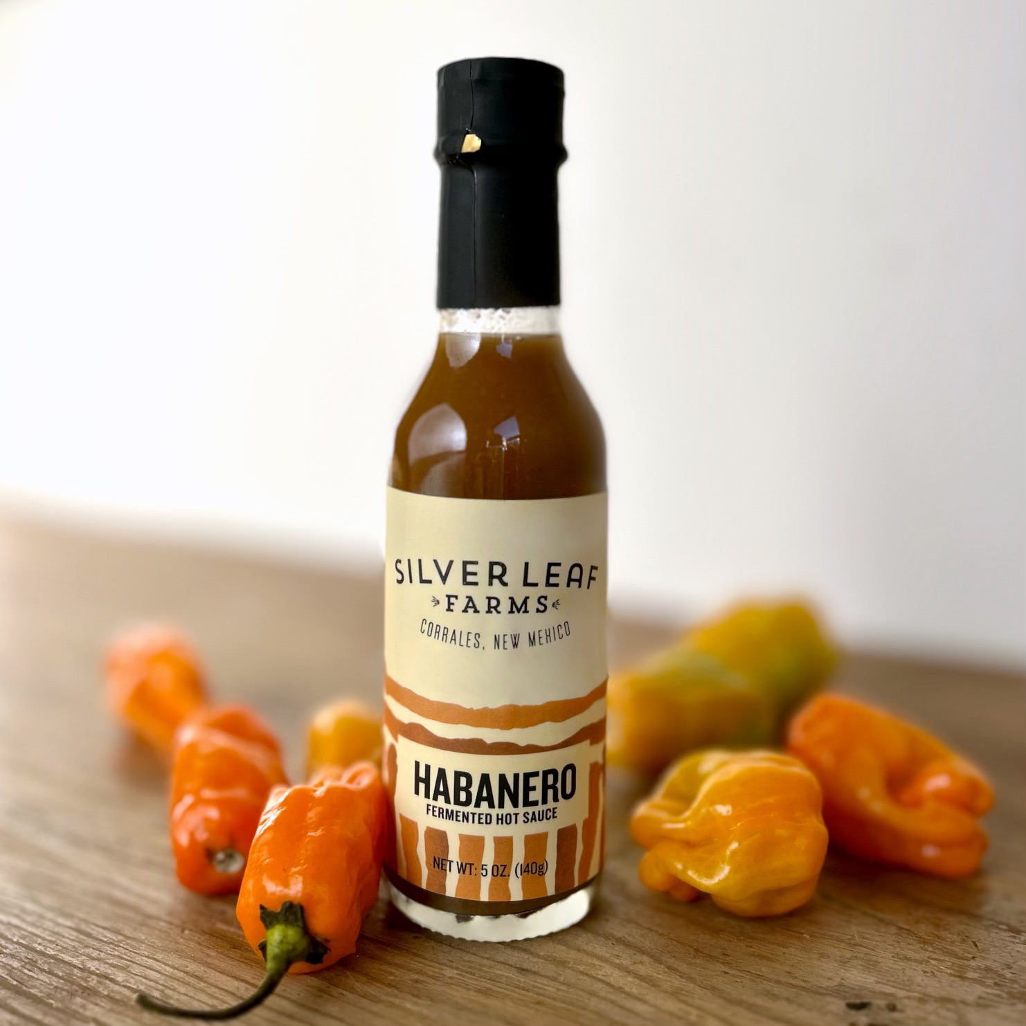 Silver Leaf Farms Habanero Fermented Hot Sauce bottle with habanero peppers
